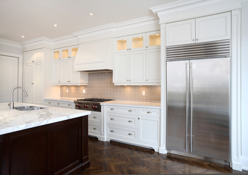 stainless steel double door fridge intergrated into kitchen renovation