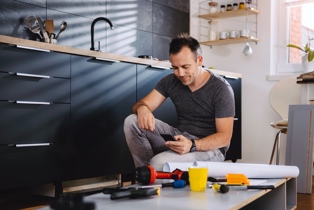 contractor on phone using social
