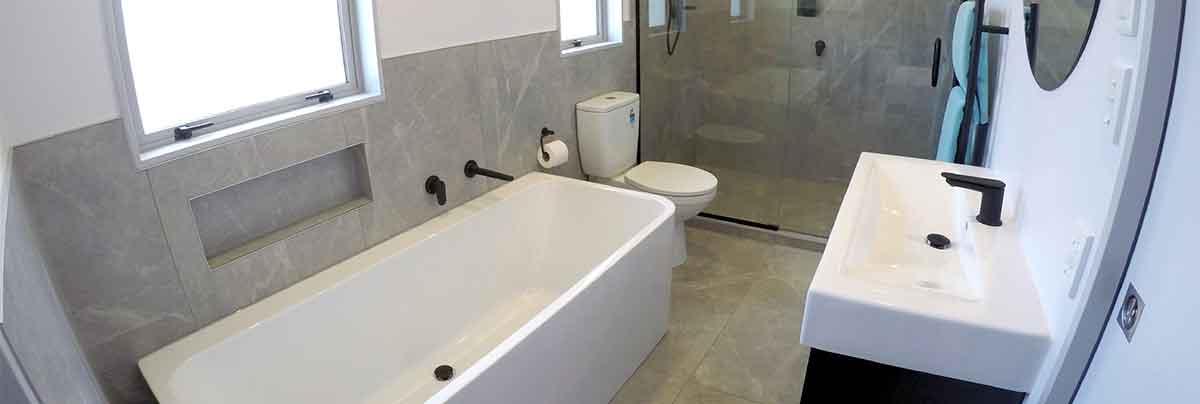 A combined bathroom, toilet and laundry in Palmerston North | Project