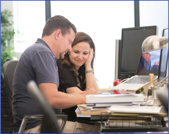 Wave employees working at desk