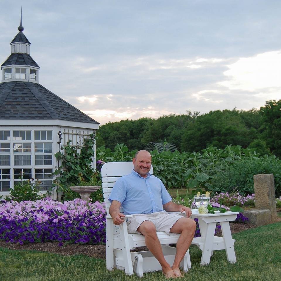 Owner Dan Schlabach sitting in front of one of our wonderful products.