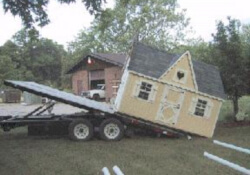 Delivering a pre-built playhouse.