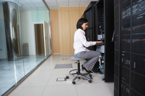 Woman working in cloud server environment