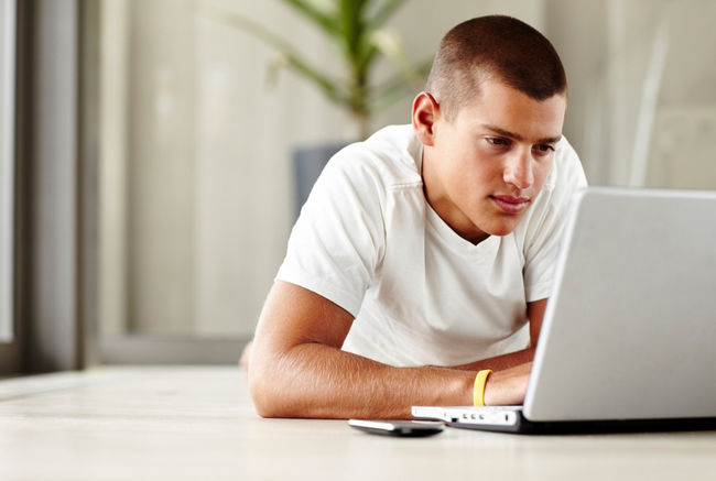 Intense dude uses computer