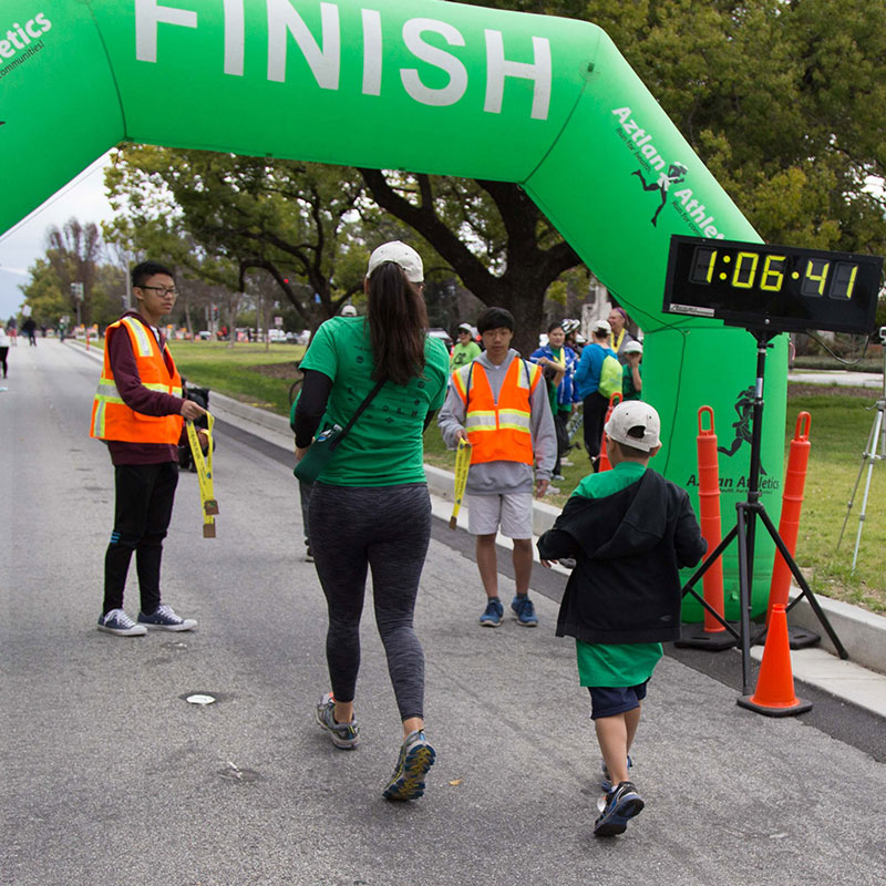 Runners approaching a finish line