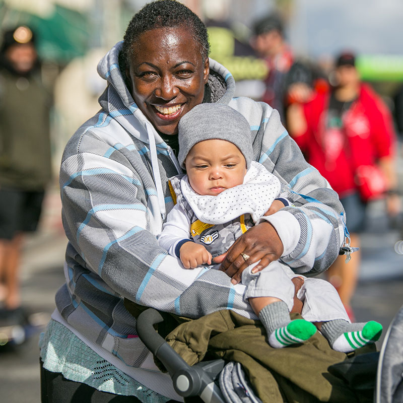 Woman and child enjoying an event