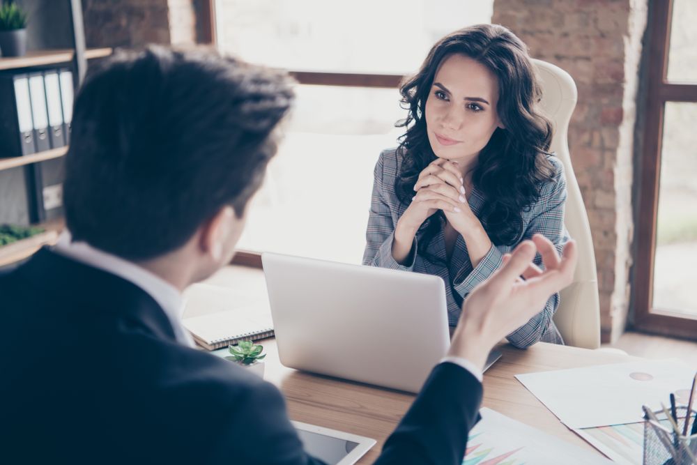 A business woman and man having a meeting.