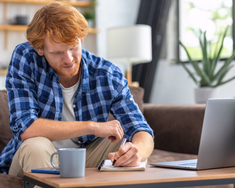Man using a laptop.