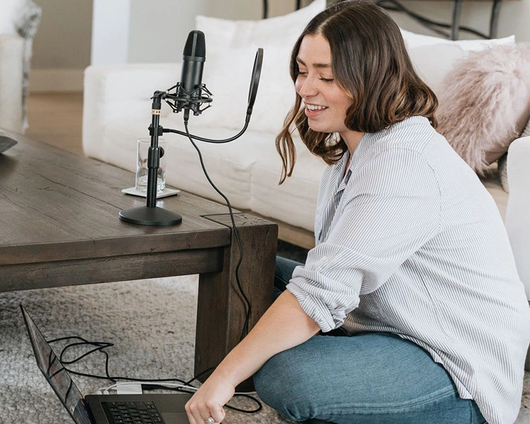 Woman recording a podcast