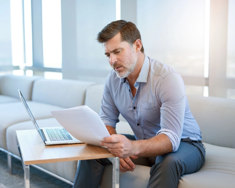 man reading over and getting familiar his sales scripts