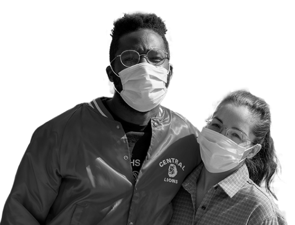 Two people wearing masks and glasses