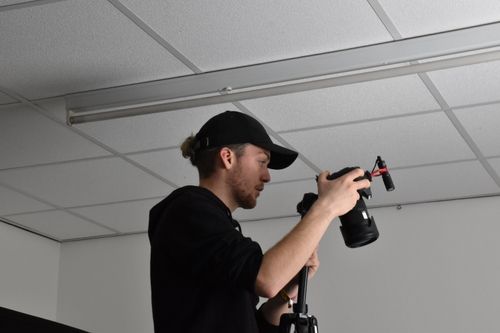 Lasse Cornelius filming a scene from the top