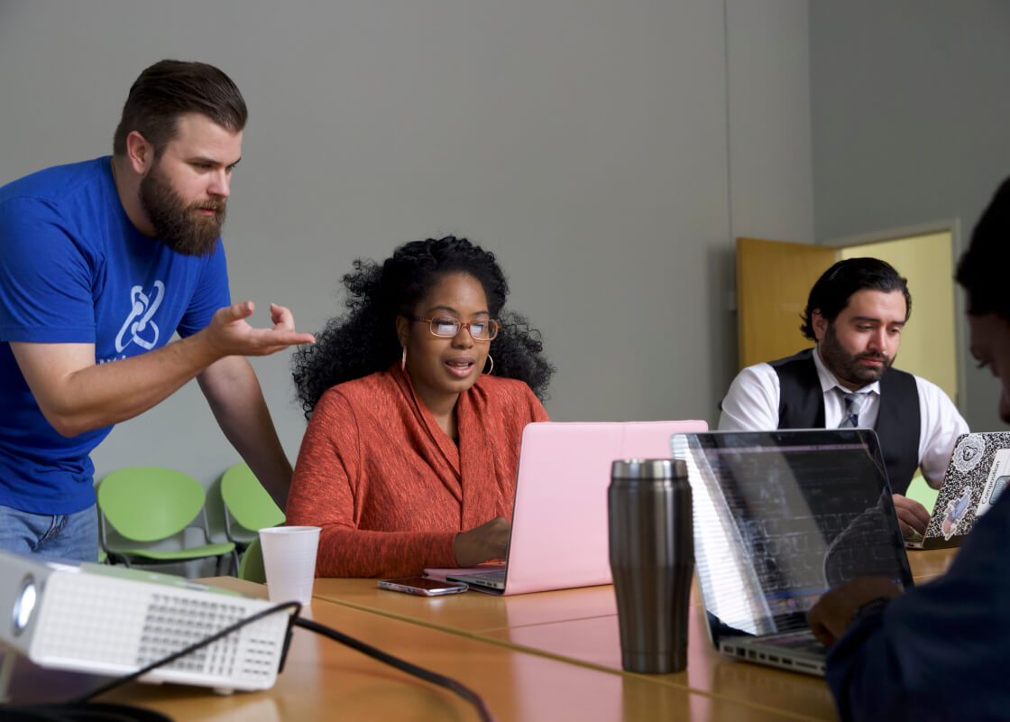 people talking in meeting room
