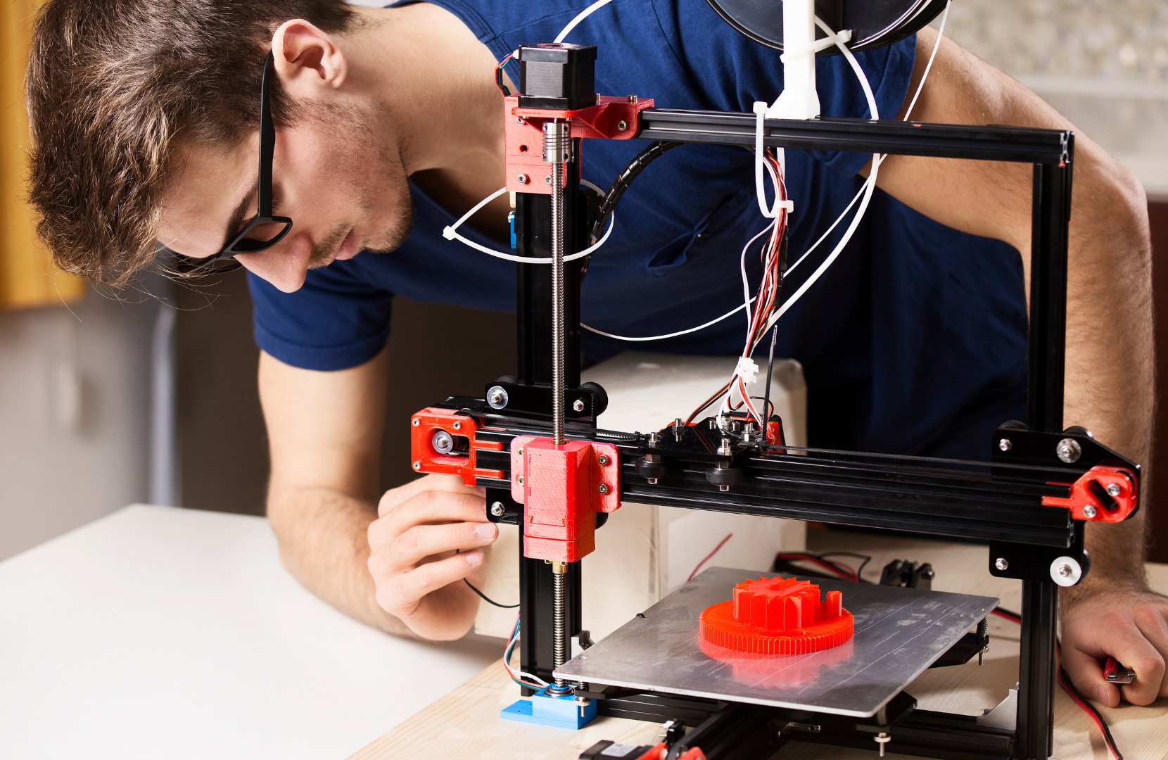 student with 3D printer