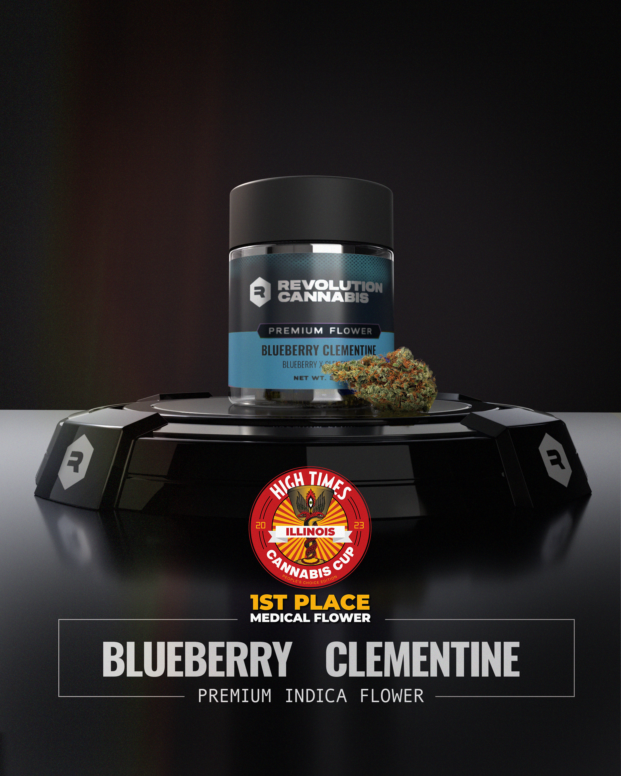A jar of Blueberry Clementine with the flower in front of it.
