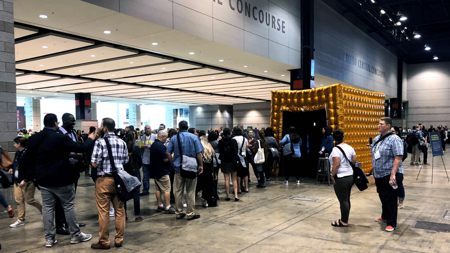 Starbucks baristas line up to engage with coffee growers around the world through Portals at Starbuck's annual barista event.