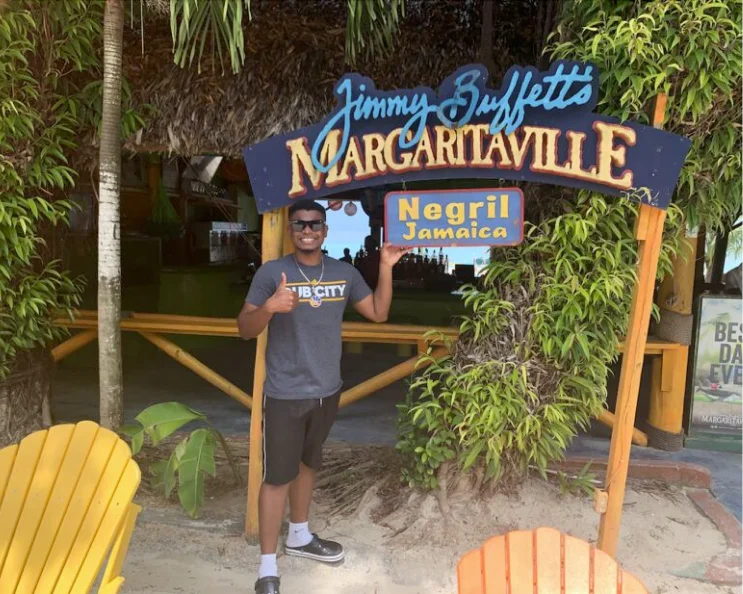 Javair posing for a photo at Margaritaville