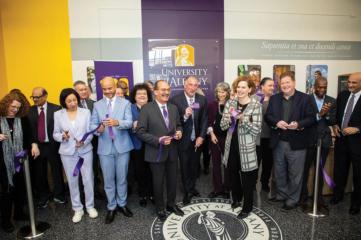 President Rodriguez and several other members of UAlbany leadership cut a purple ribbon at the ceremony.