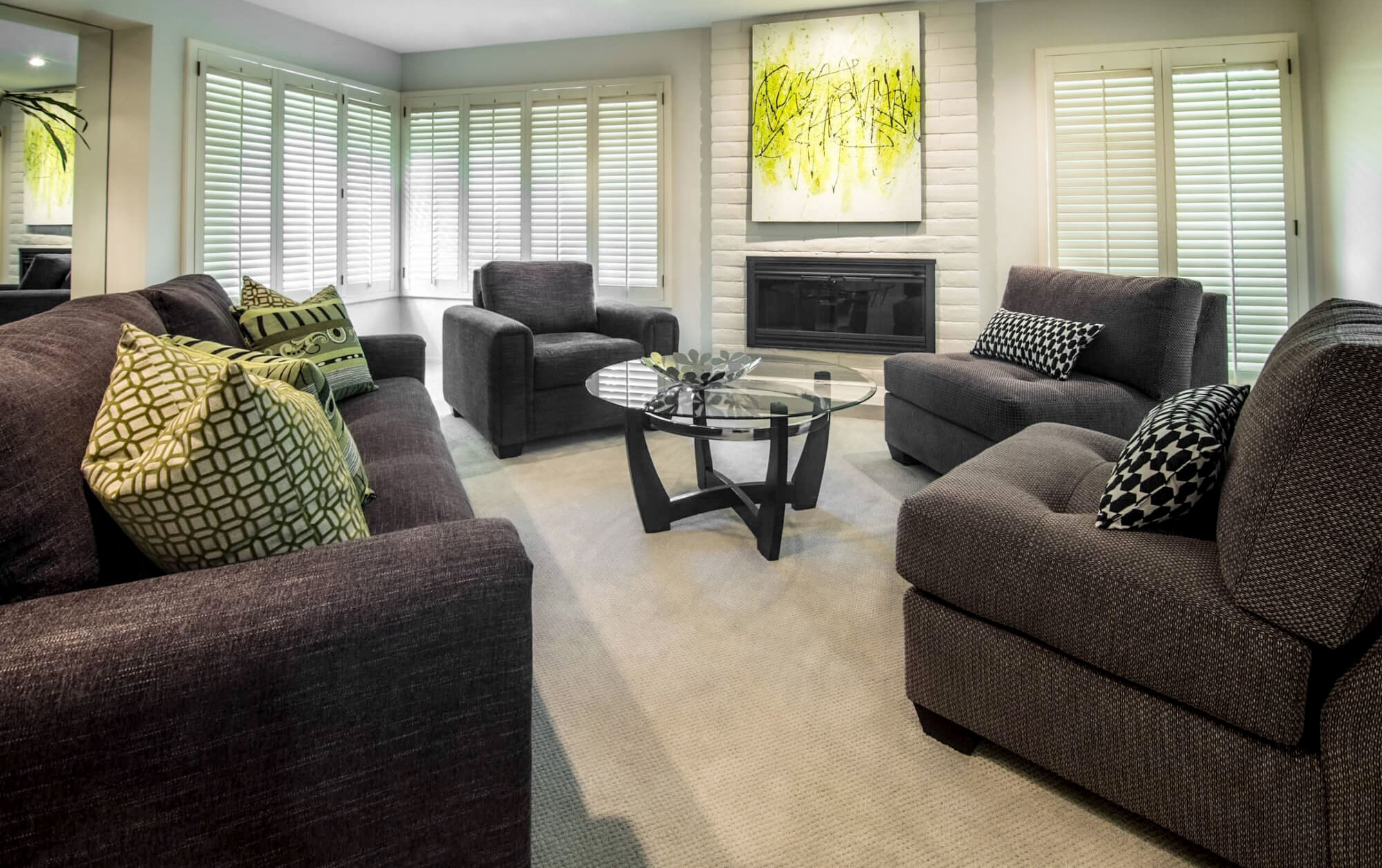 Custom grey sofas and arm chairs in living room