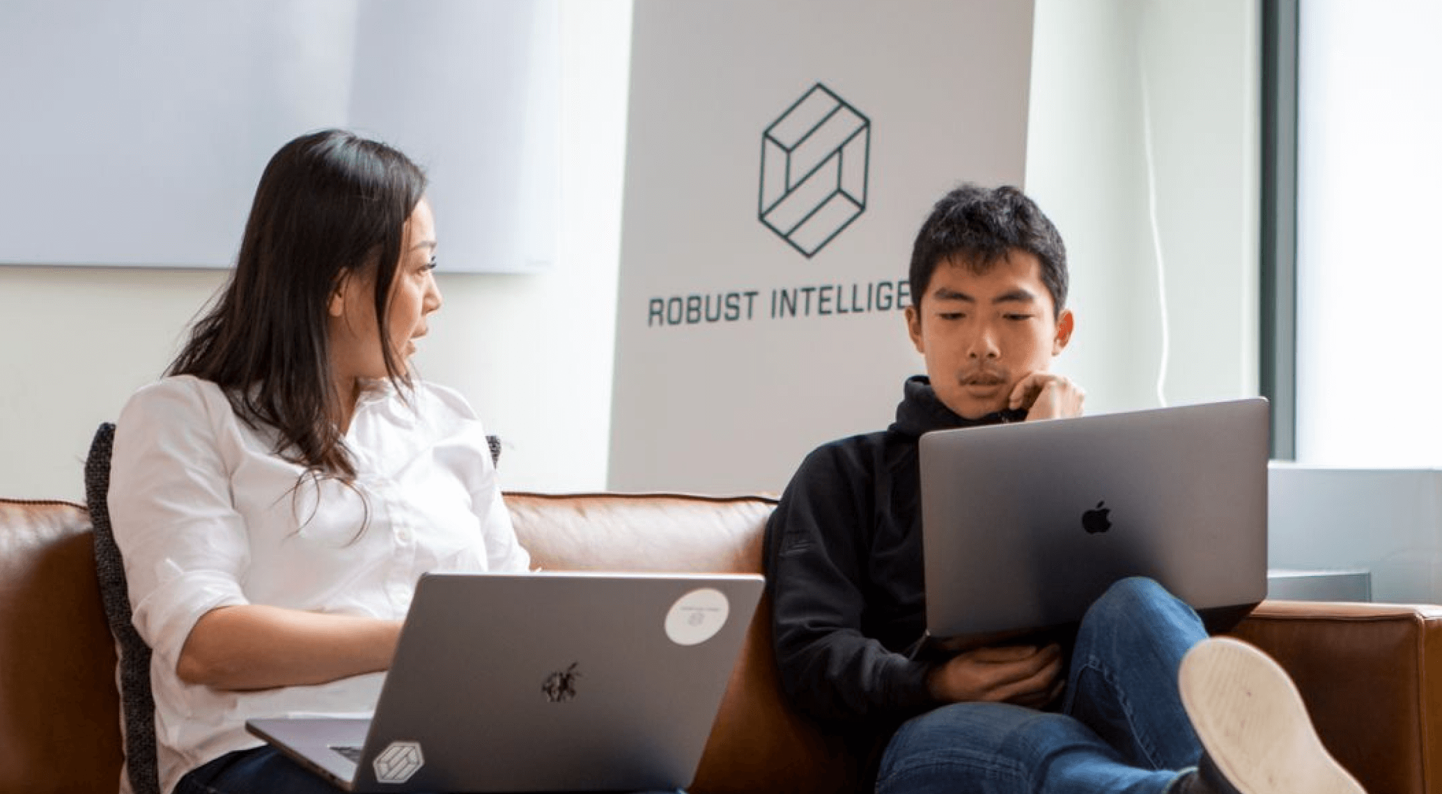 image of two robust intelligence employee