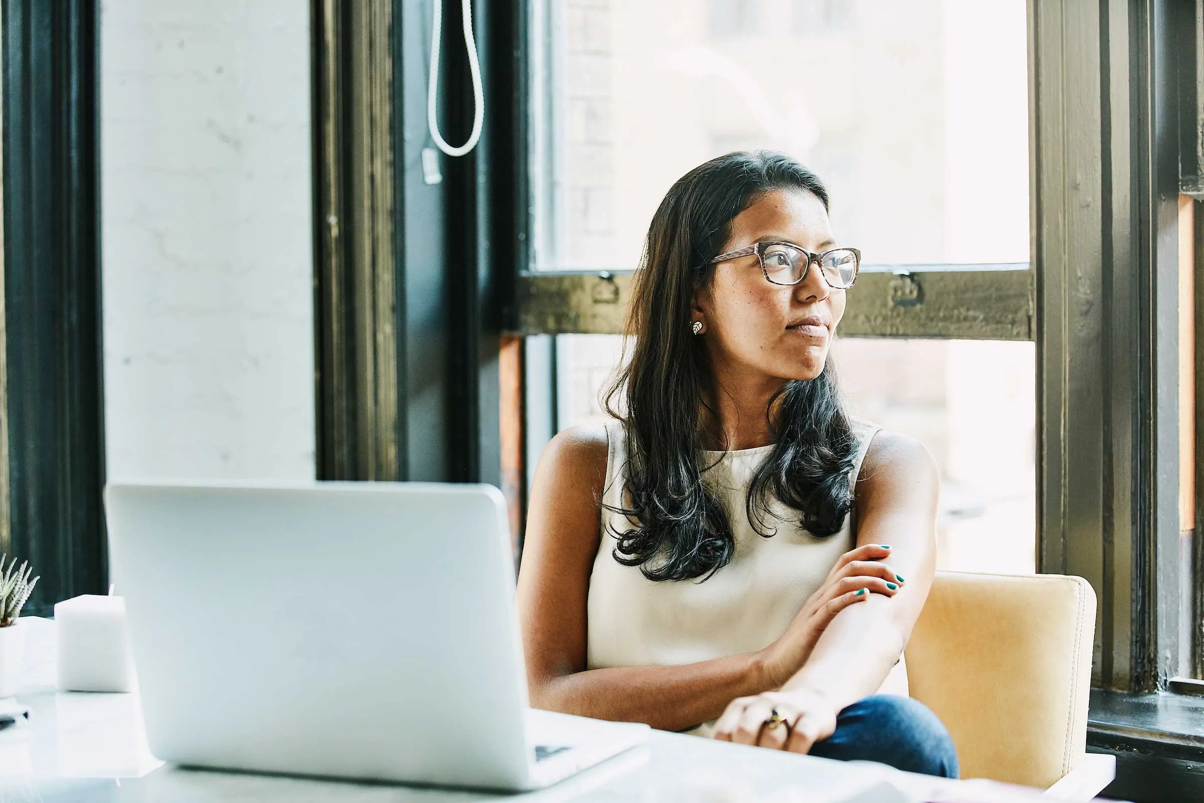 A Remote worker taking a break from their laptop.