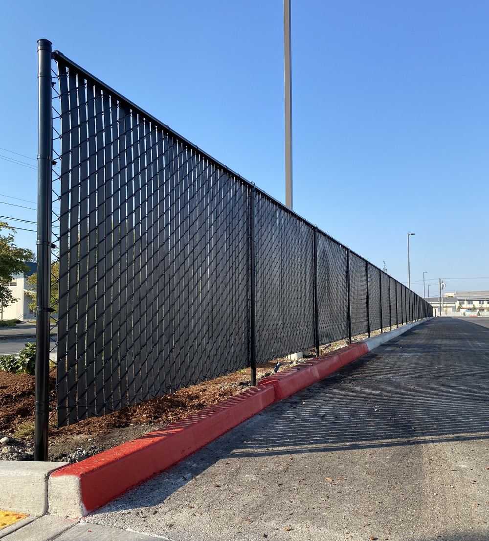 Black Slatted Chain-Link Fence in Marysville 