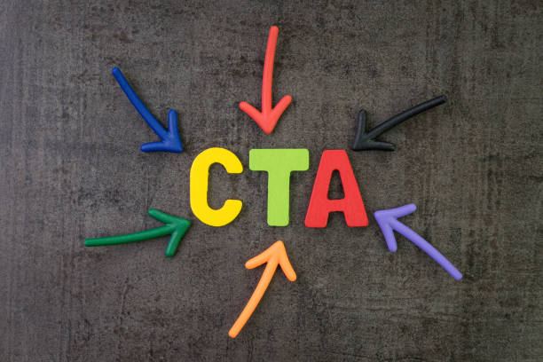 Call to action in advertising and communication concept, multi color arrows pointing to the word CTA at the center of black cement chalkboard wall.