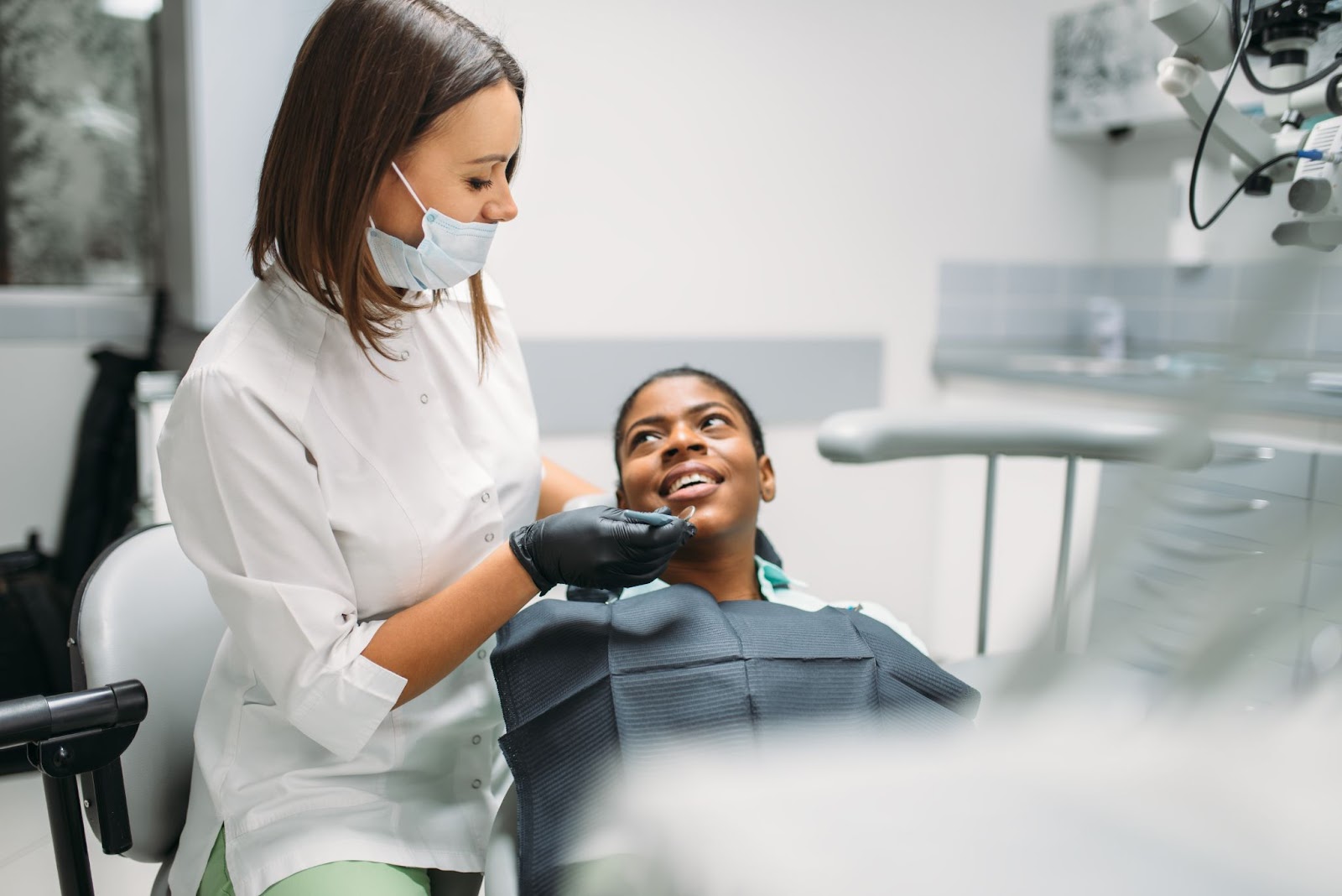 a patient getting their teeth cleaned