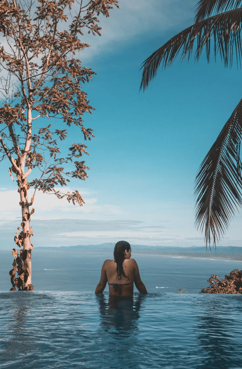 a girl relaxing in nature and enjoying beautiful scenery