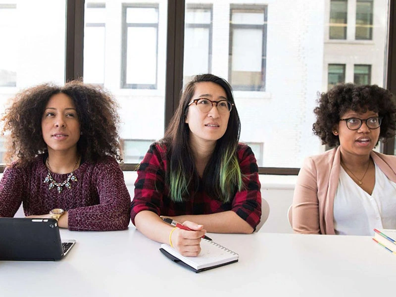 Three women in a healthcare meeting