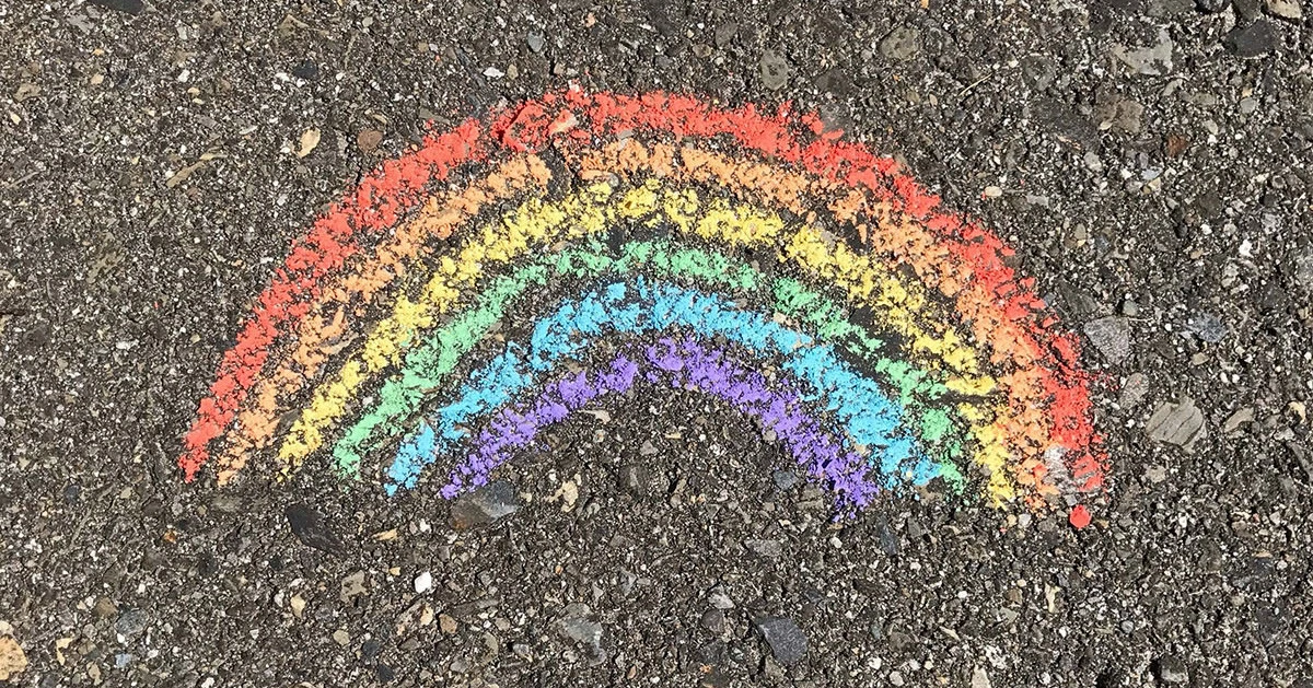 Pride rainbow drawn on pavement