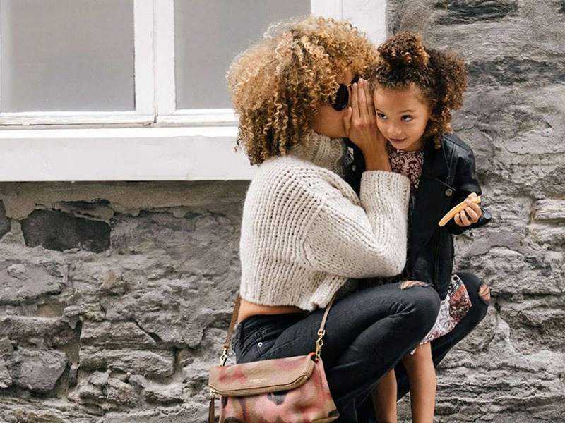 Mother talking to daughter