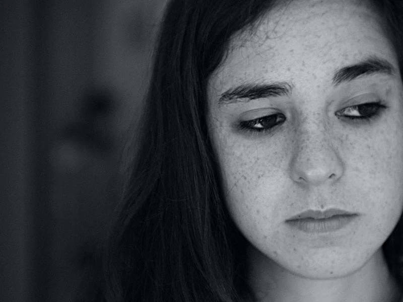young women contemplating therapy