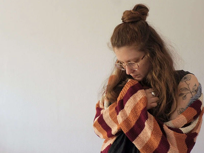 Young woman alone and looking lonely suffering from depression