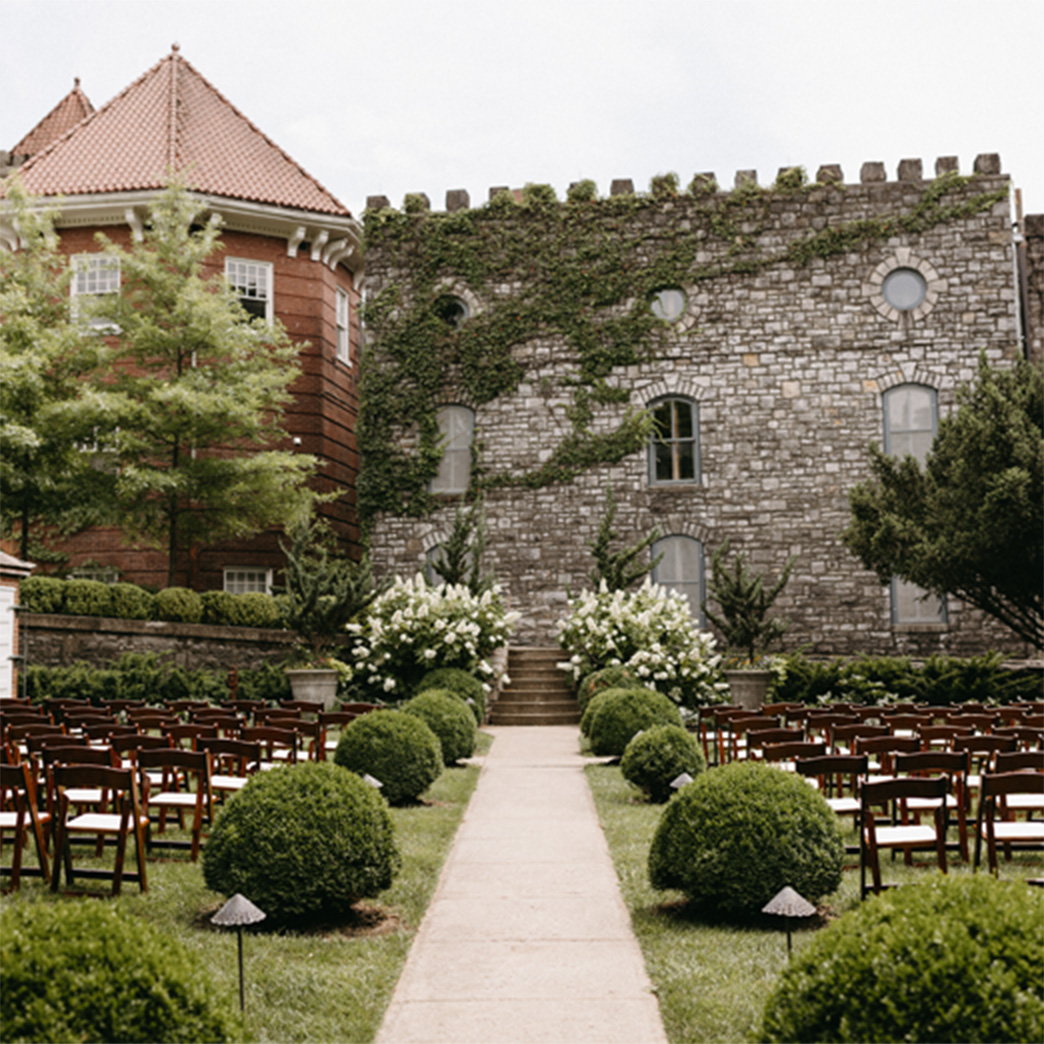 Sunken Garden with chairs and white runner set for a wedding ceremony