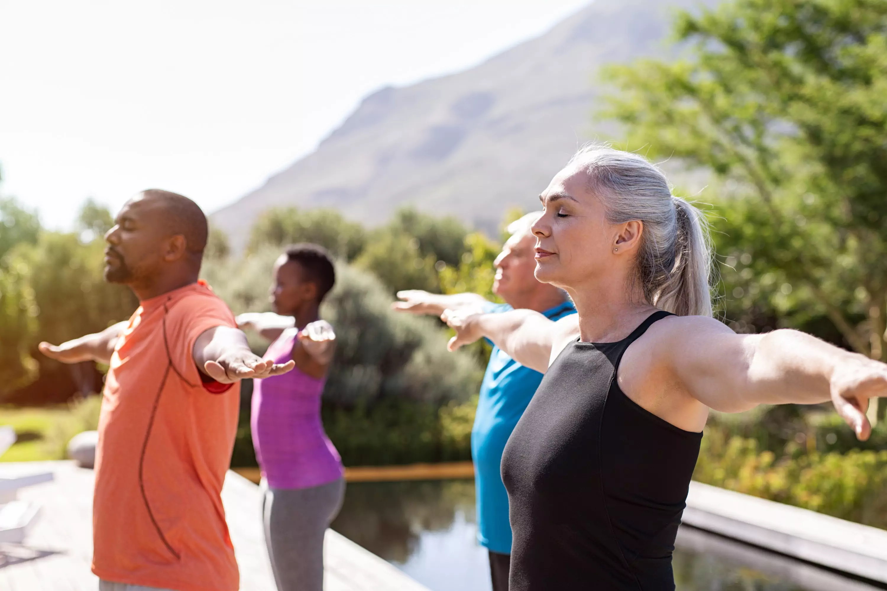 a group of people working out outdoors