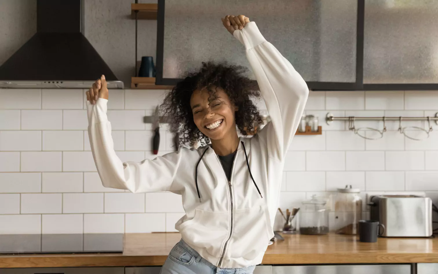 a person dancing and smiling
