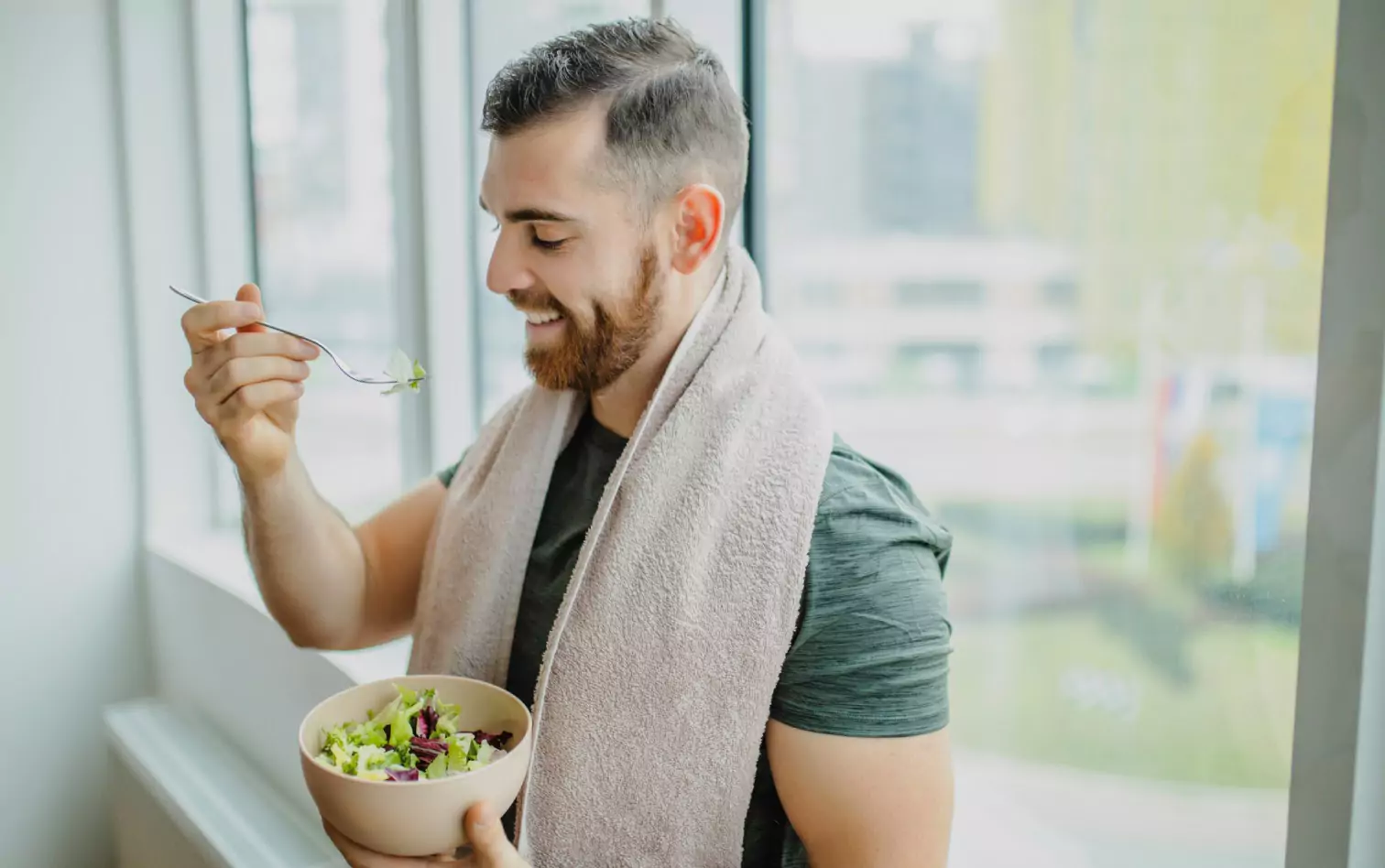 a person eating a salad