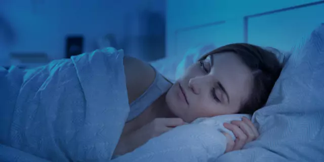 a person sleeping in bed