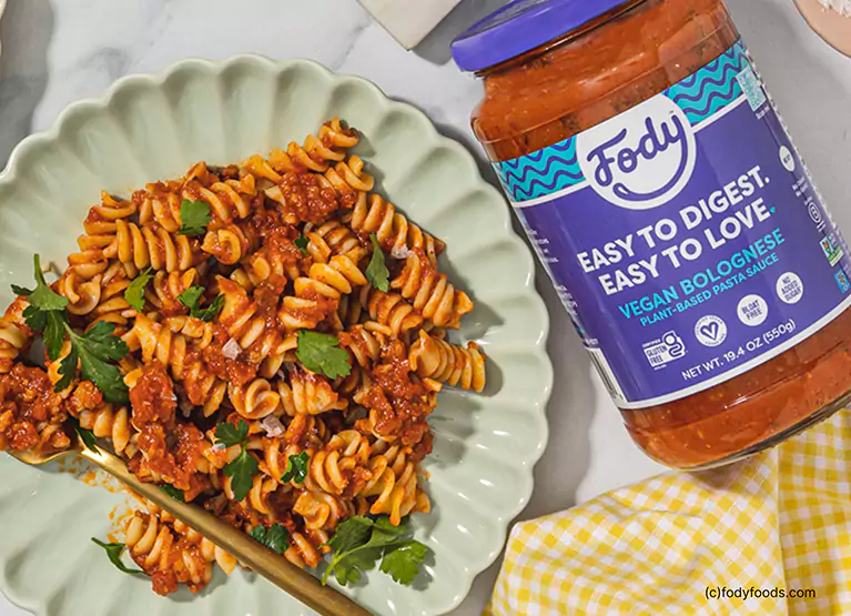 Plate of pomodoro pasta with low FODMAP vegan bolognese sauce