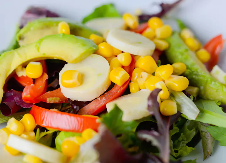 Sandwich filling with eggs, avocado, corn