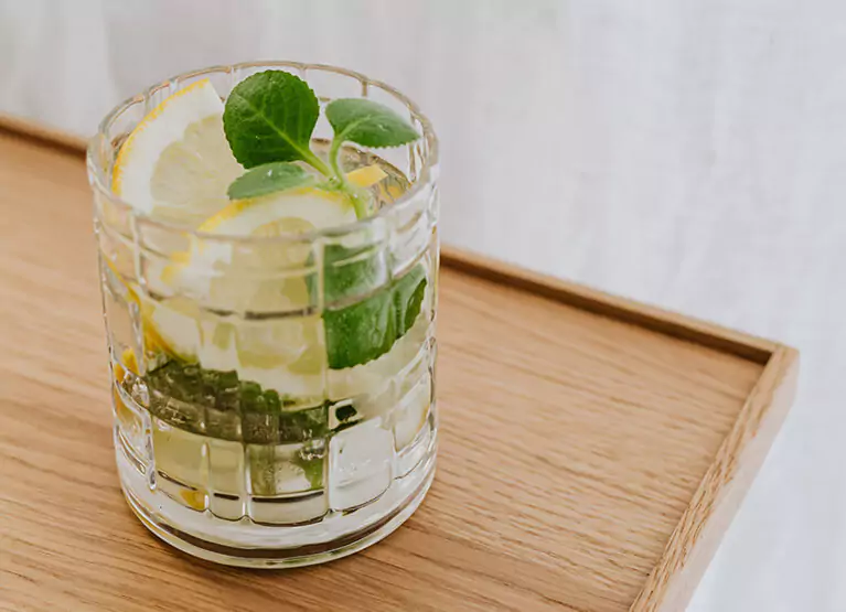 a glass of honey mint lemonade