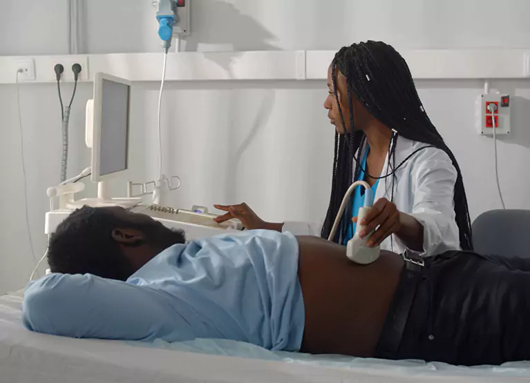 a doctor doing an ultrasound on someone
