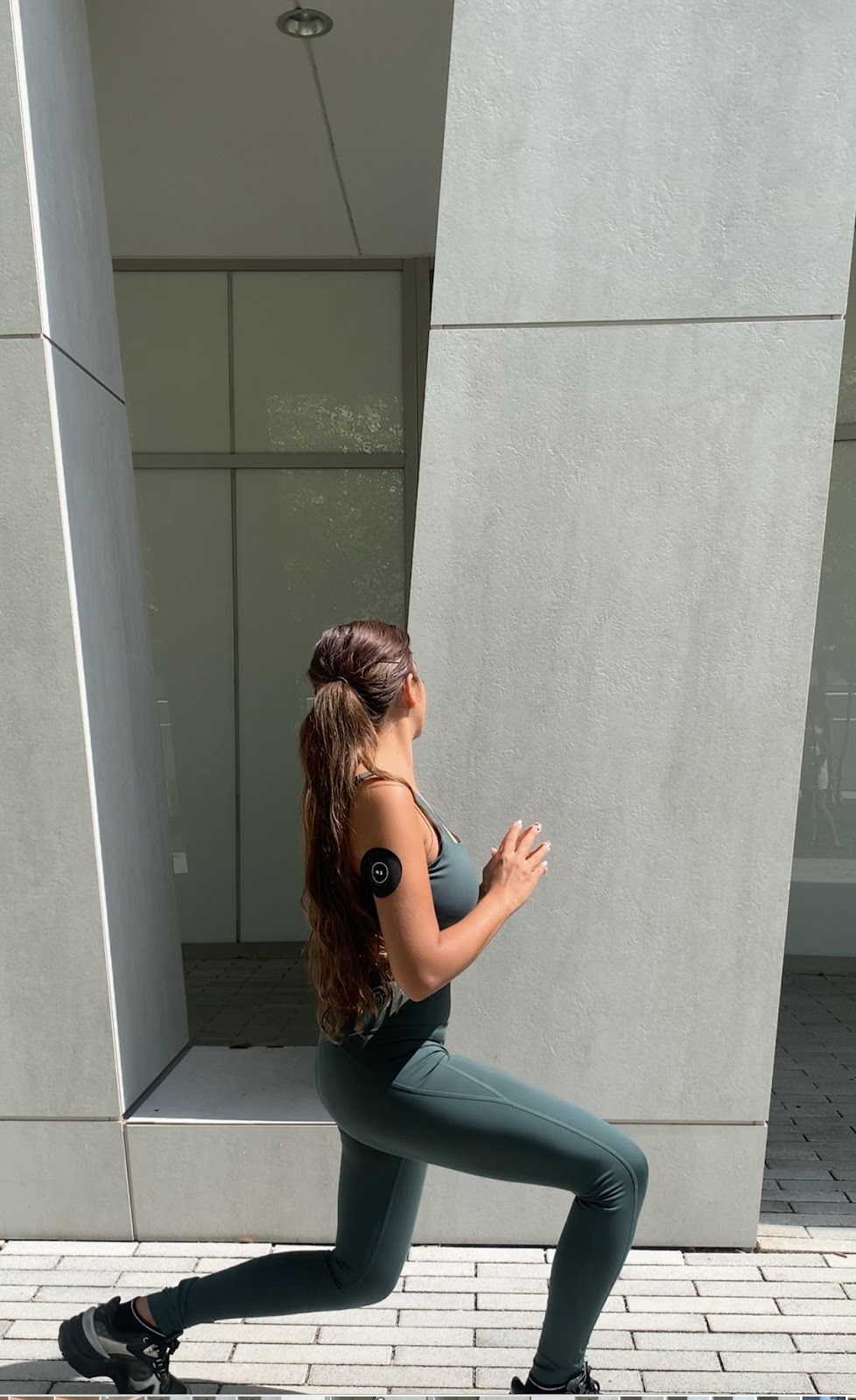 Woman doing lunge outdoors