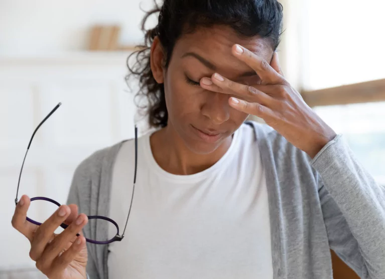 a woman feeling dizzy