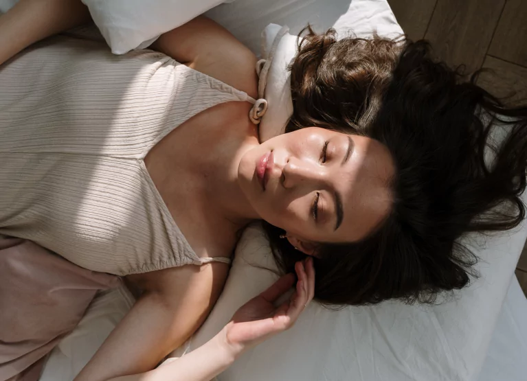 a girl resting in bed