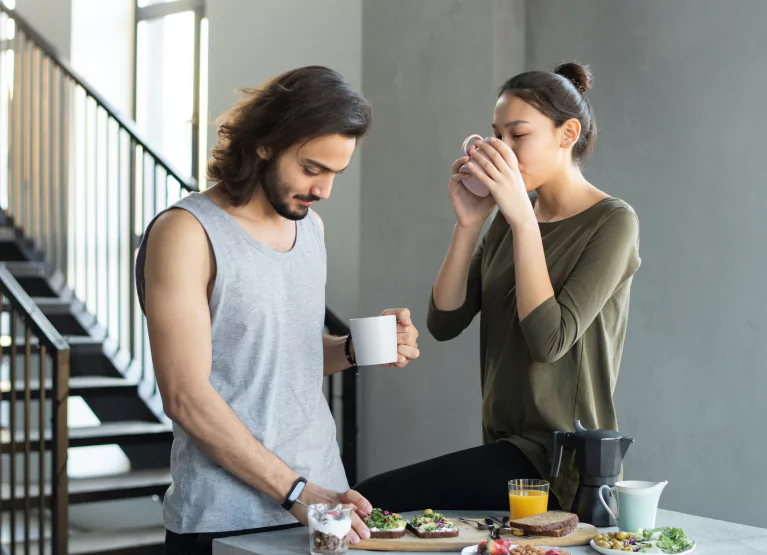 two people eating their meal slowly
