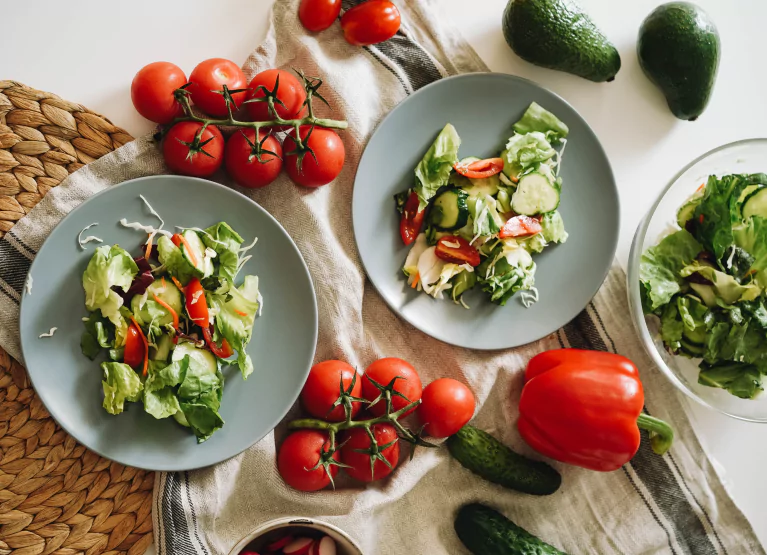 two bowls of salad