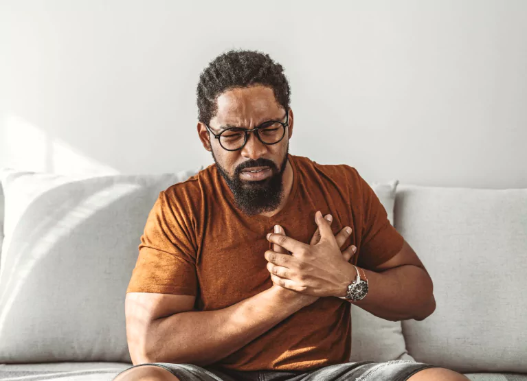 a man having heartburn