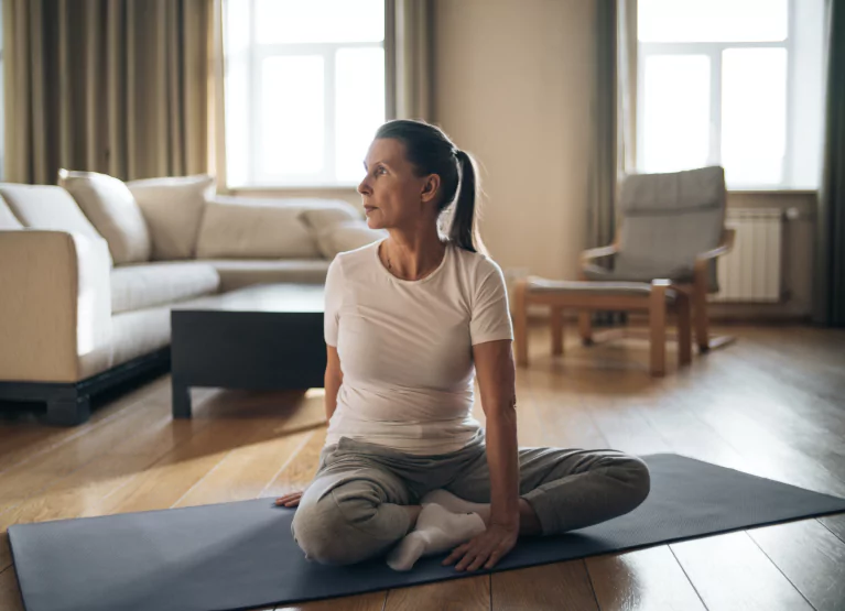 a woman stretching at home